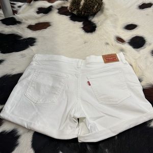 COPY - Levi white mid length shorts.